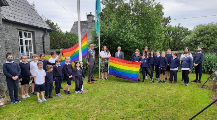 INTO presents Pride flag to a Tipperary National School