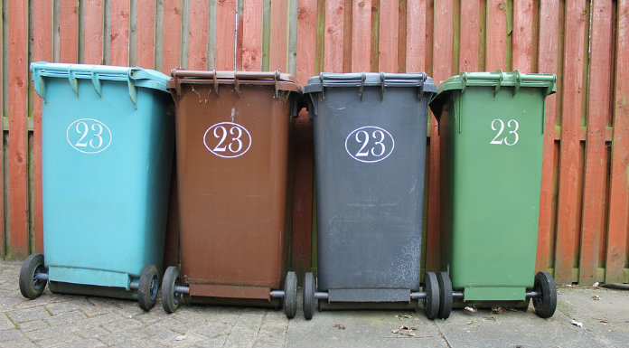 Communications Minister plays down bin charge concerns